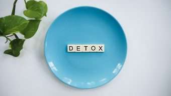 detox text on round blue plate: detox every day