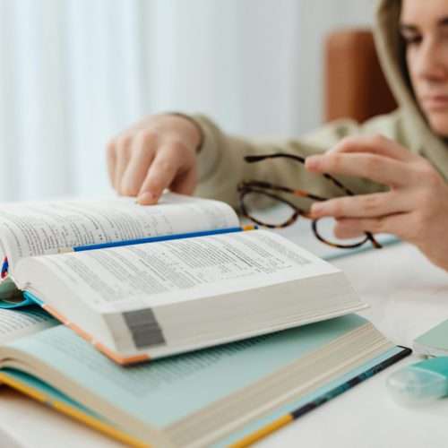 man tired of reading books in a revision space