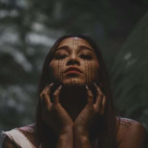 your Saturn return - woman with face art