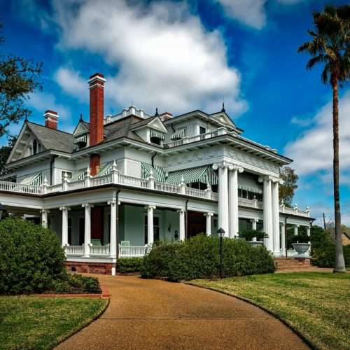 revamp your driveway - large white house