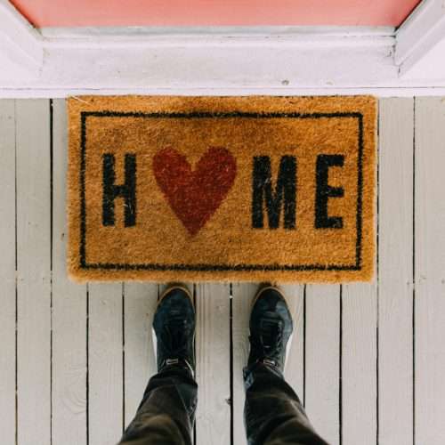 door mat in front of a spotless home