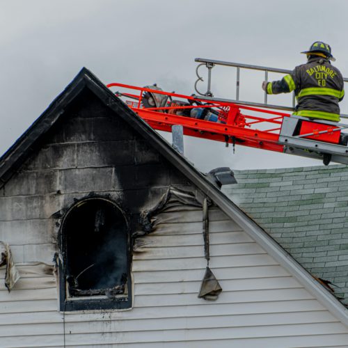 firefighter on a roof
