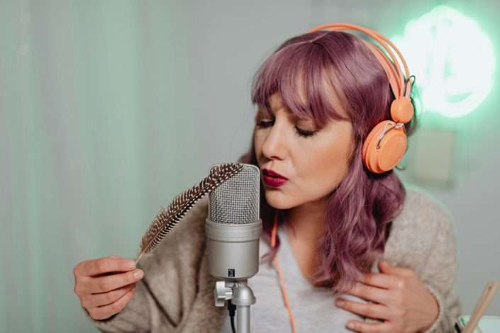 hearing health - woman wearing a headphones