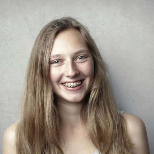 woman with braces with orthodontists