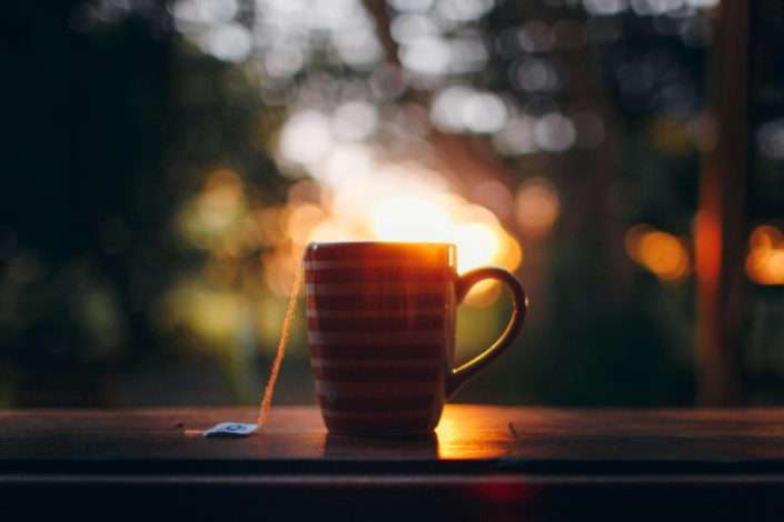 cup of hot tea in the garden
