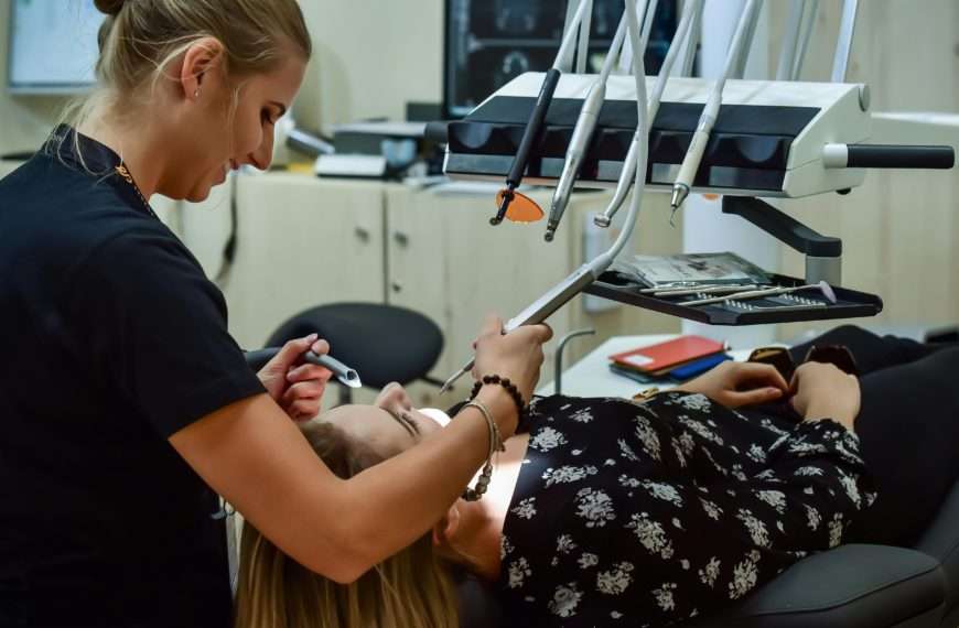 woman at dentist - Family And Cosmetic Care