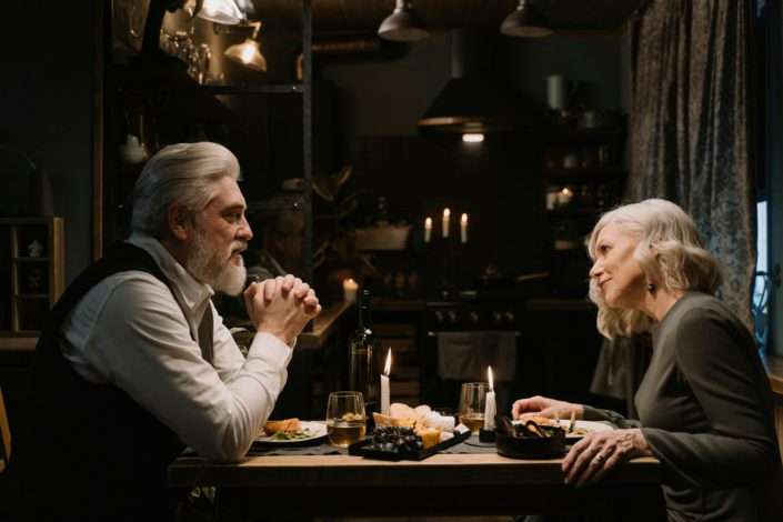 couple having dinner - creating a calmer home with small sensory changes