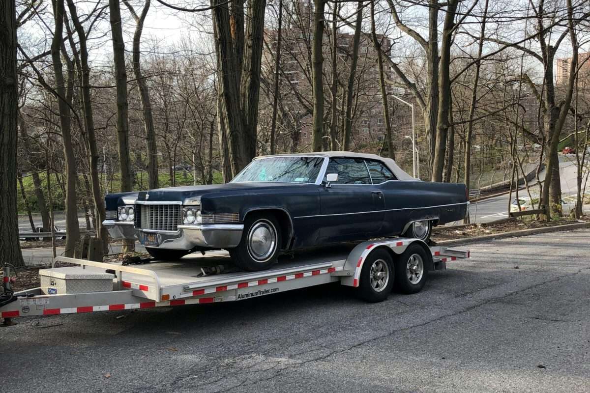 open vs closed Car Trailer
