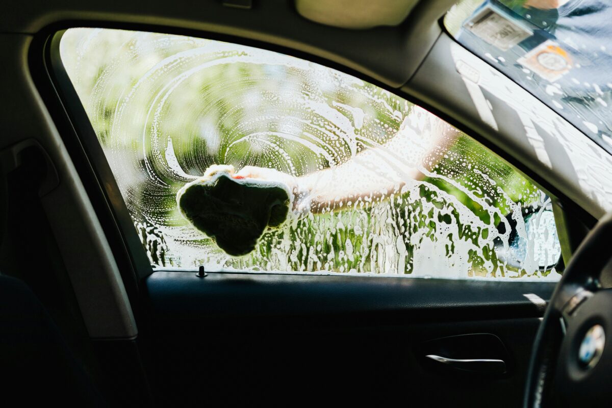 seasonal car care - washing a car