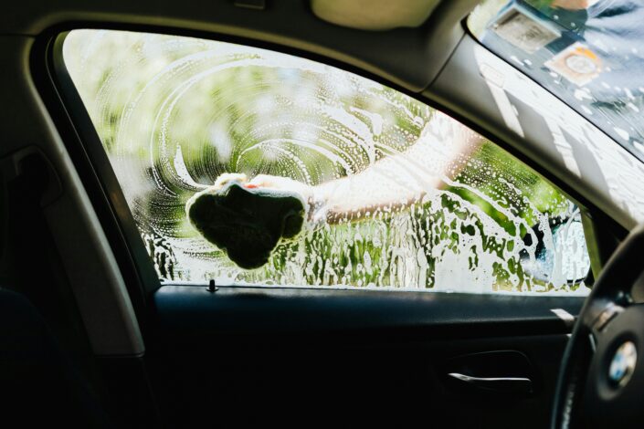 seasonal car care - washing a car