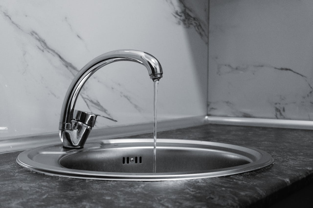 water faucet - signs you have a clogged main sewer