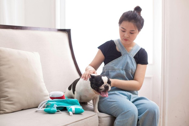 Finding a Trusted Vet for Stress-Free Pet Care - woman with her pet dog