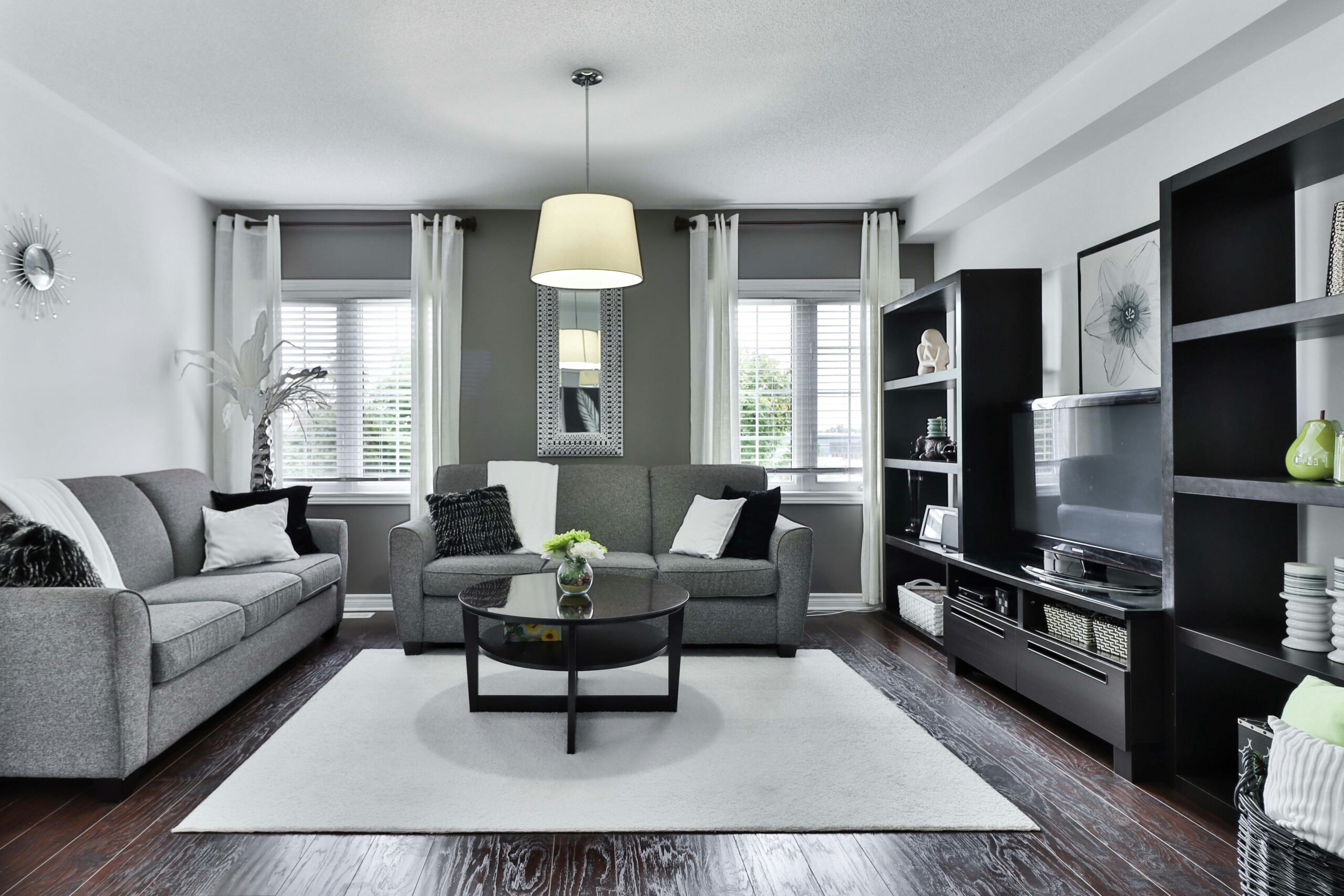 black and white photo of furniture in a living room