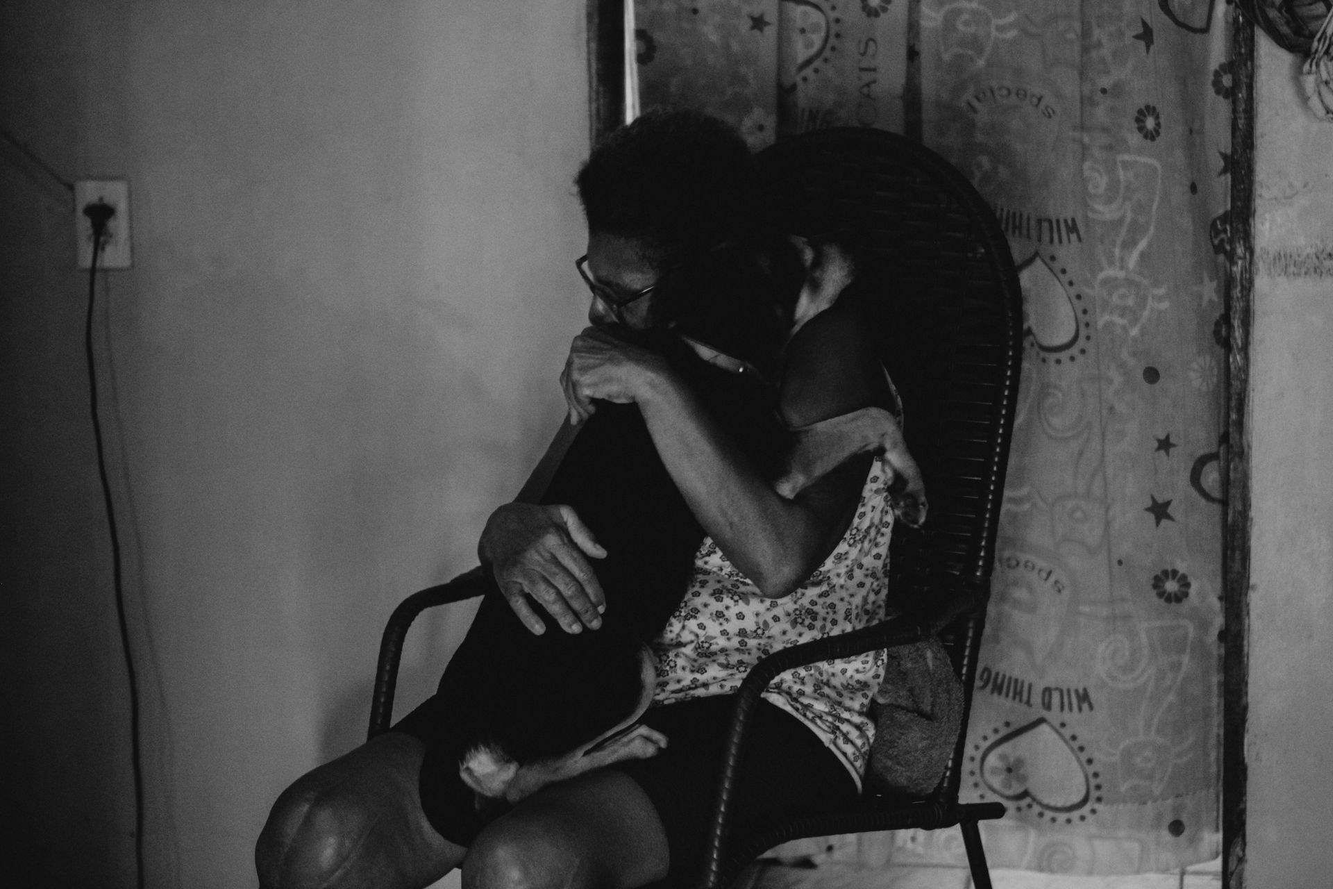 grief over losing a pet - woman hugging her dog