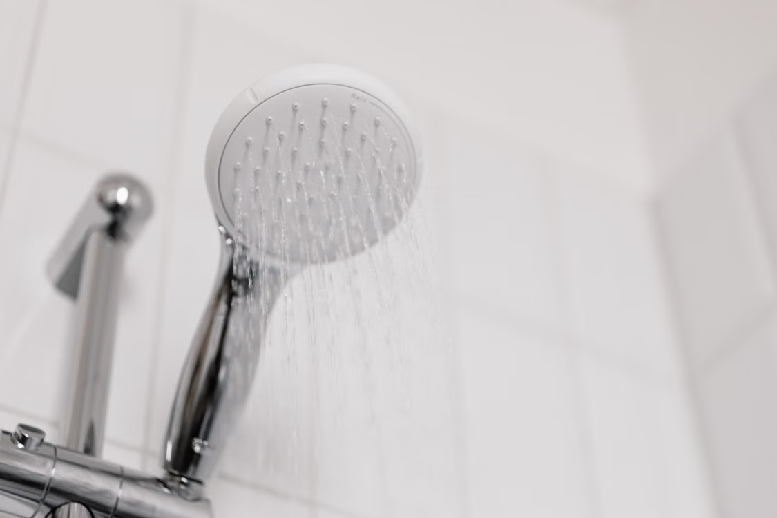 choosing the Right Size Water Heater - shower head