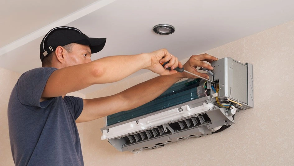 Comprehensive HVAC Services - technician testing refrigerant lines
